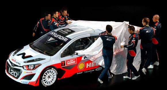 The Hyundai team unveiling the i20 WRC car