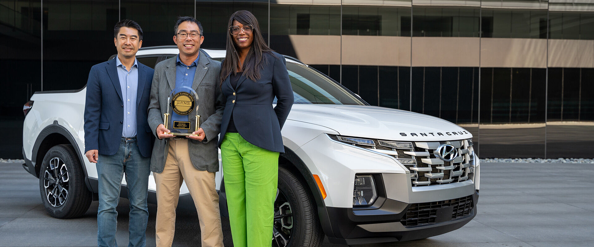 Ricky Lao, director, product planning and mobility strategy, Hyundai Motor North America; Trevor Lai, senior manager, product planning, Hyundai Motor North America; and Olabisi Boyle, vice president, product planning and mobility strategy, Hyundai Motor North America accept the J.D. Power APEAL trophy for the Hyundai Santa Cruz in Fountain Valley, Calif., July 20, 2023. 