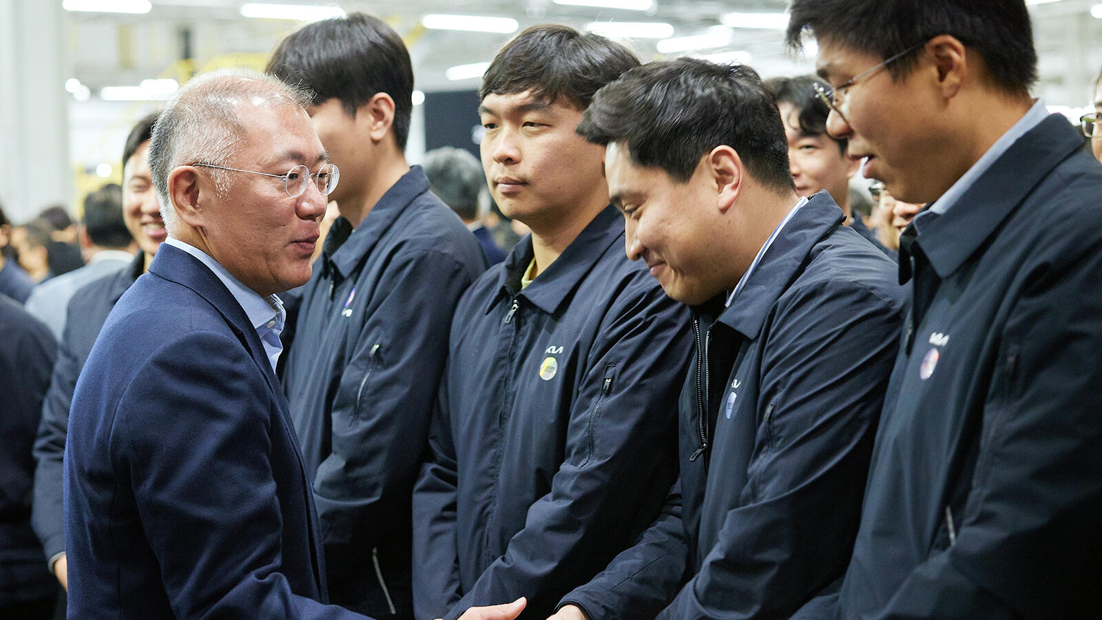 Hyundai Motor Group Executive Chair Euisun Chung looks around Kia AutoLand Gwangmyeong and encourages the employees